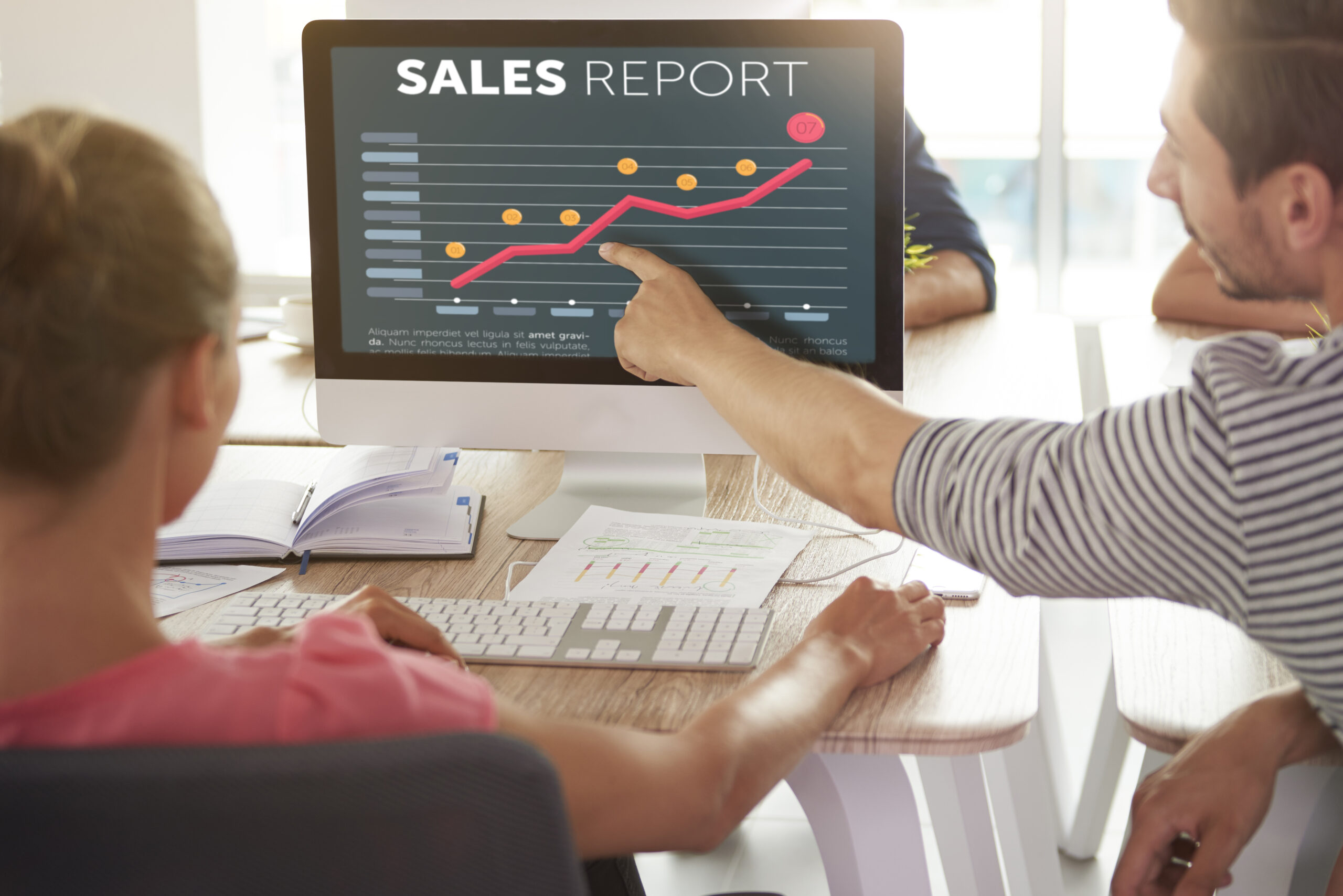 Man pointing at the chart